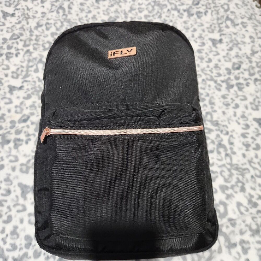Ifly Travel Backpack Black 18x11x5 Durable Fabric And Metallic Hardware.